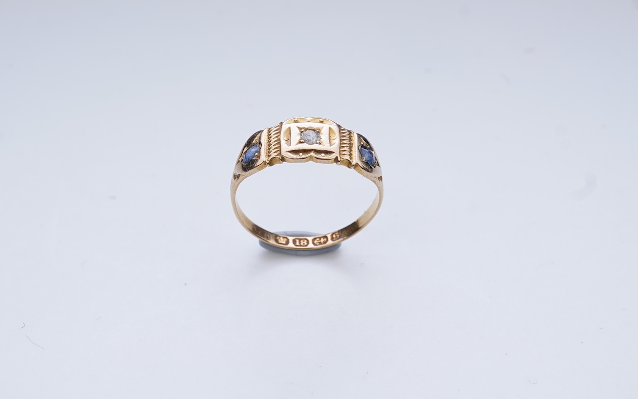 A Victorian sapphire and diamond three-stone ring, circa 1892